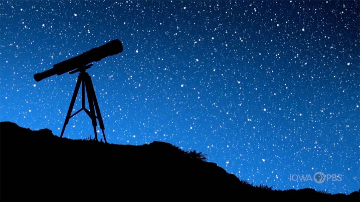 a telescope looking into the night sky
