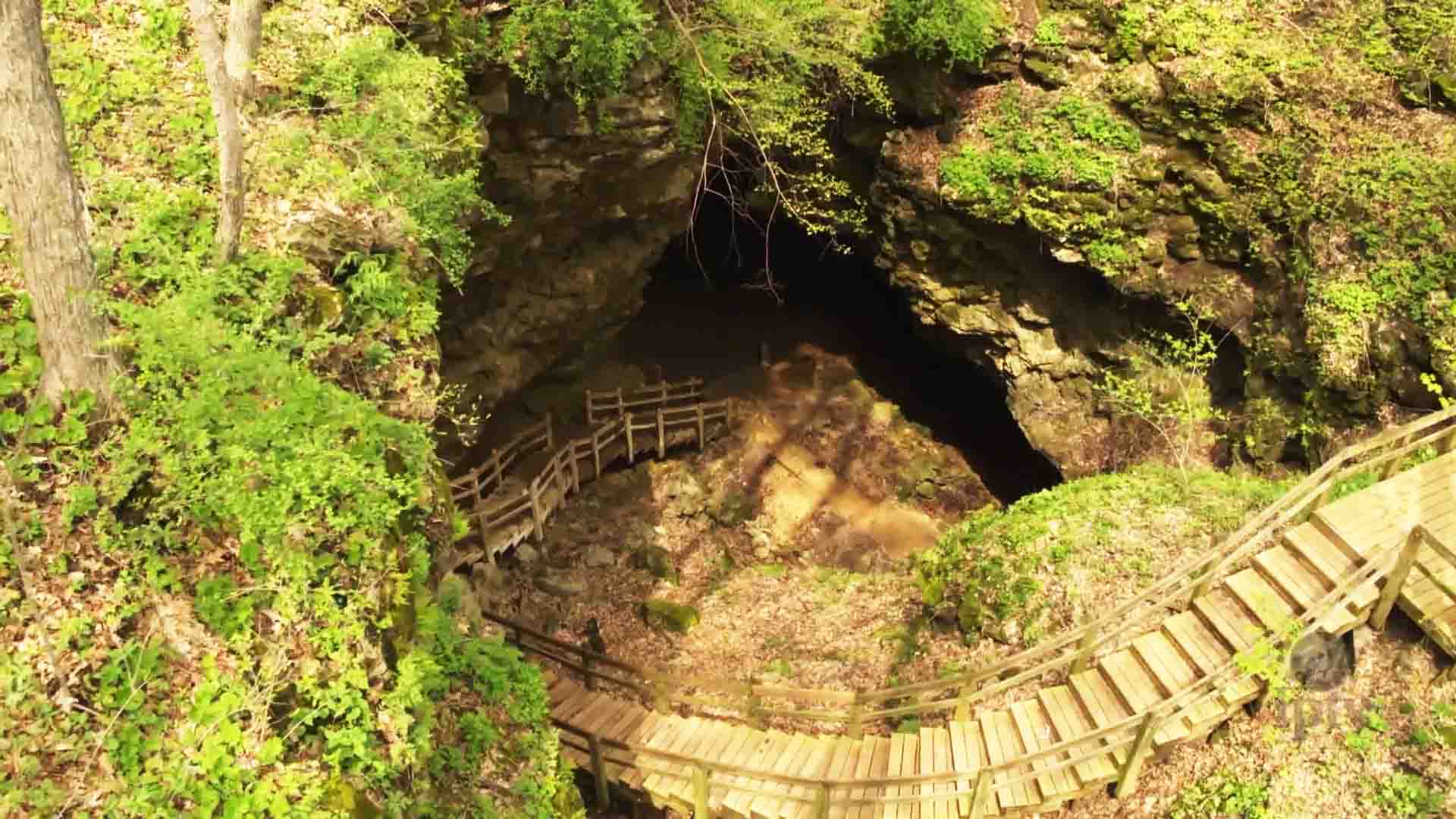 An overhead view looking down on an entrance into one of the Maquoketa Caves.