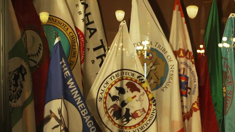 A Native American flag display at the Iowa State Capitol.