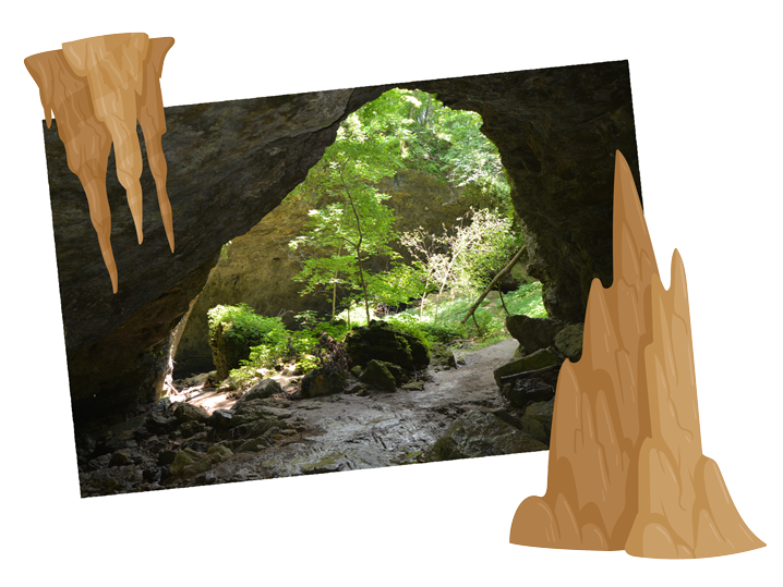 Cave arch with water running through it below