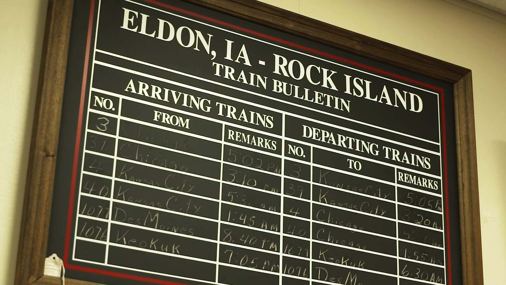 A train bulletin showing the incoming and departing train times.