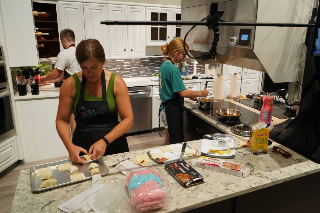 Preparing food at The Kitchen at the Fair