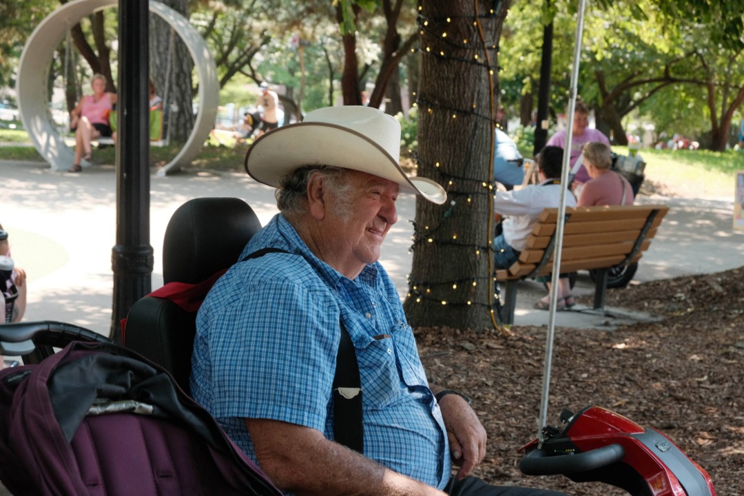 Smiling man in a cowboy hat