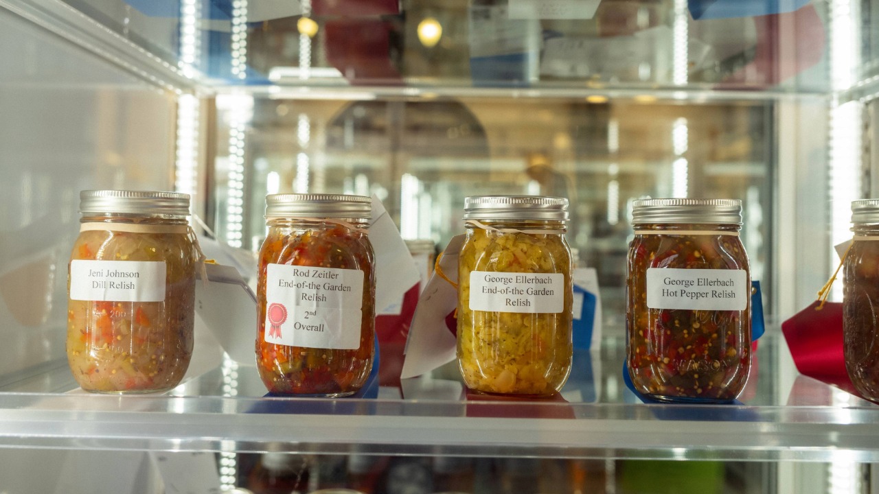 Canned goods on display in a fridge at the Elwell Family Food Center