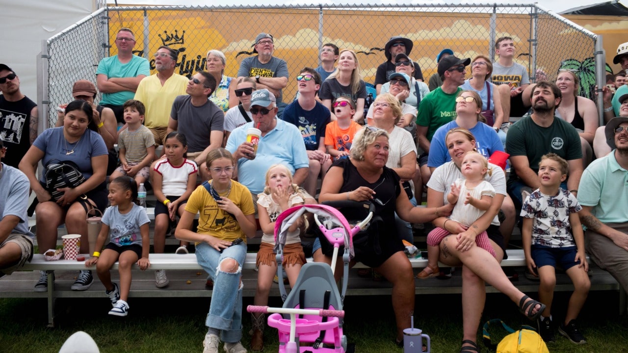Crowd watching the Flying Royals acrobats perform