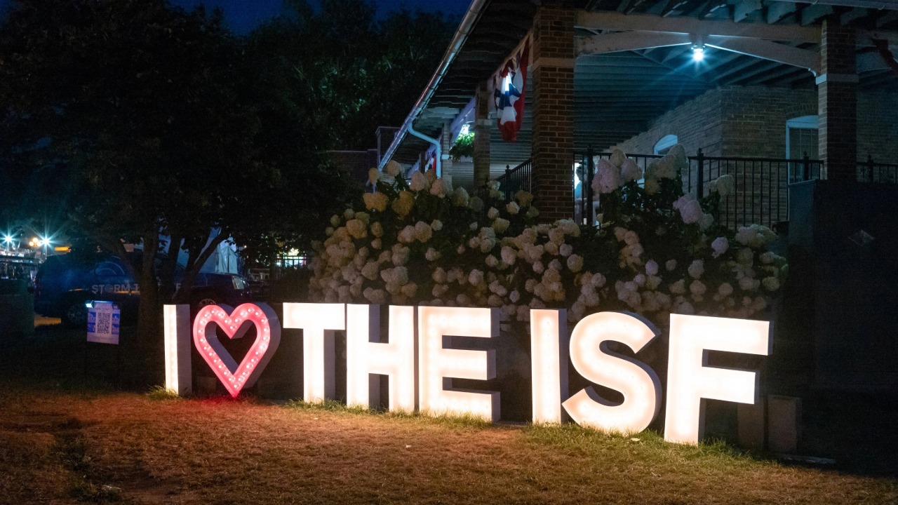 The I heart ISF sign all lit up at night