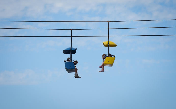 Fairgoers enjoying a ride on the skyglider.