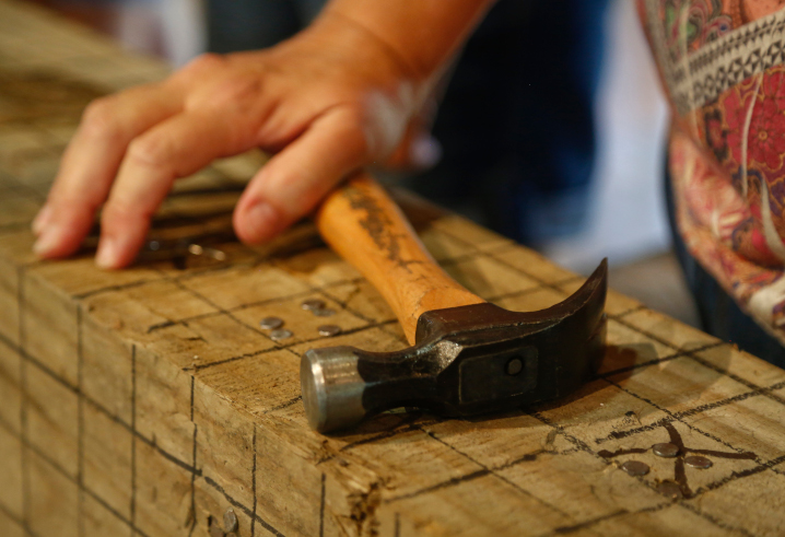 close up of hammer and nails at the nail driving contest