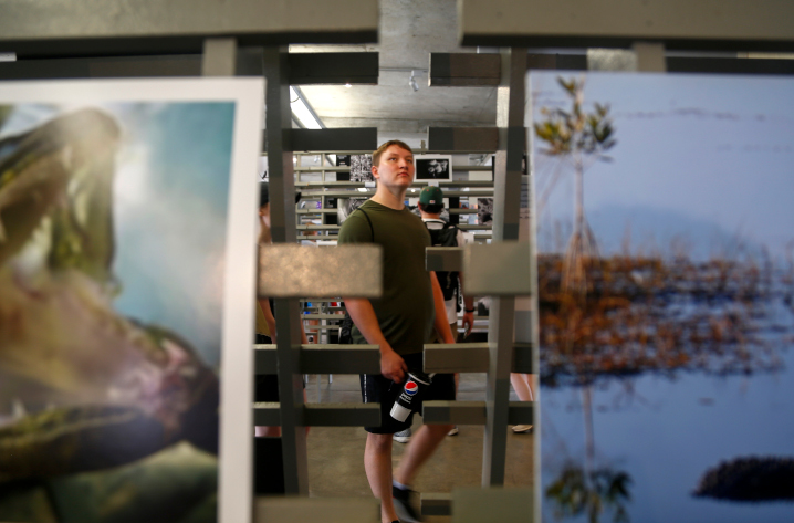 Fairgoers stopped by the Cultural Building to take a look at some award-winning photographs during the Iowa State Fair