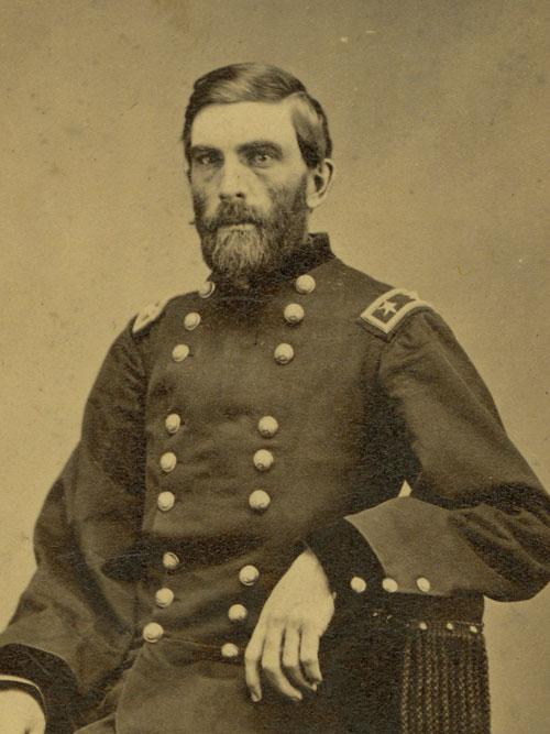 A middle-aged man in a military uniform.