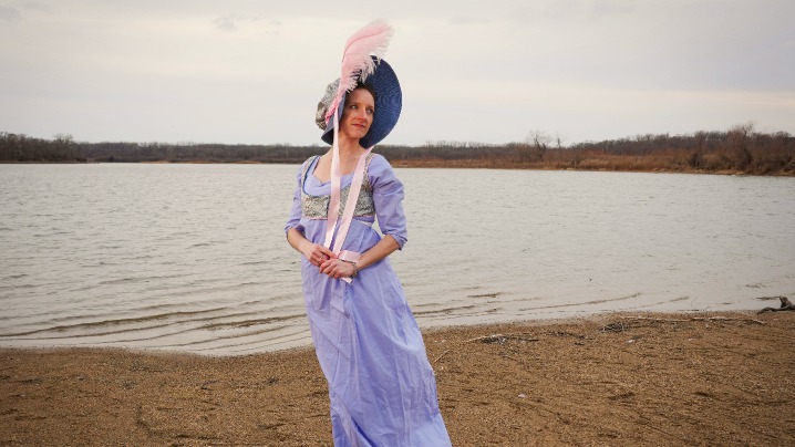 Regency era purple dress modeled by a member of the Jane Austen Society