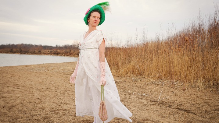 Regency era white outfit modeled by a member of the Jane Austen Society