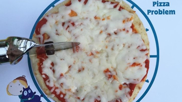 pizza problem placemat with a small pizza on top and a pizza cutter