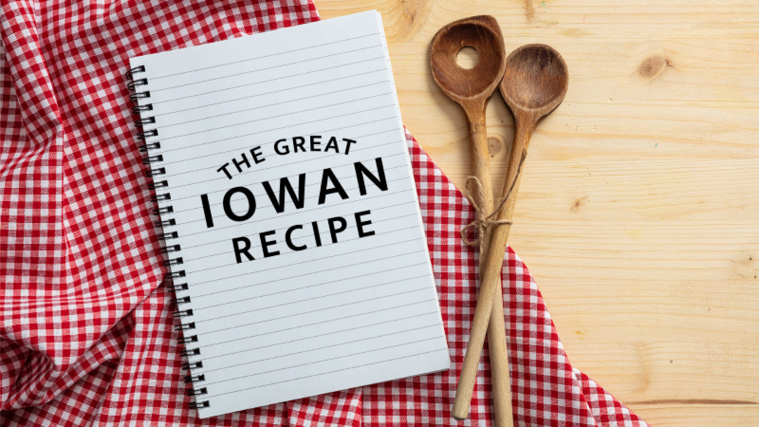 The Great Iowan Recipe text with wooden spoon and checker cloth