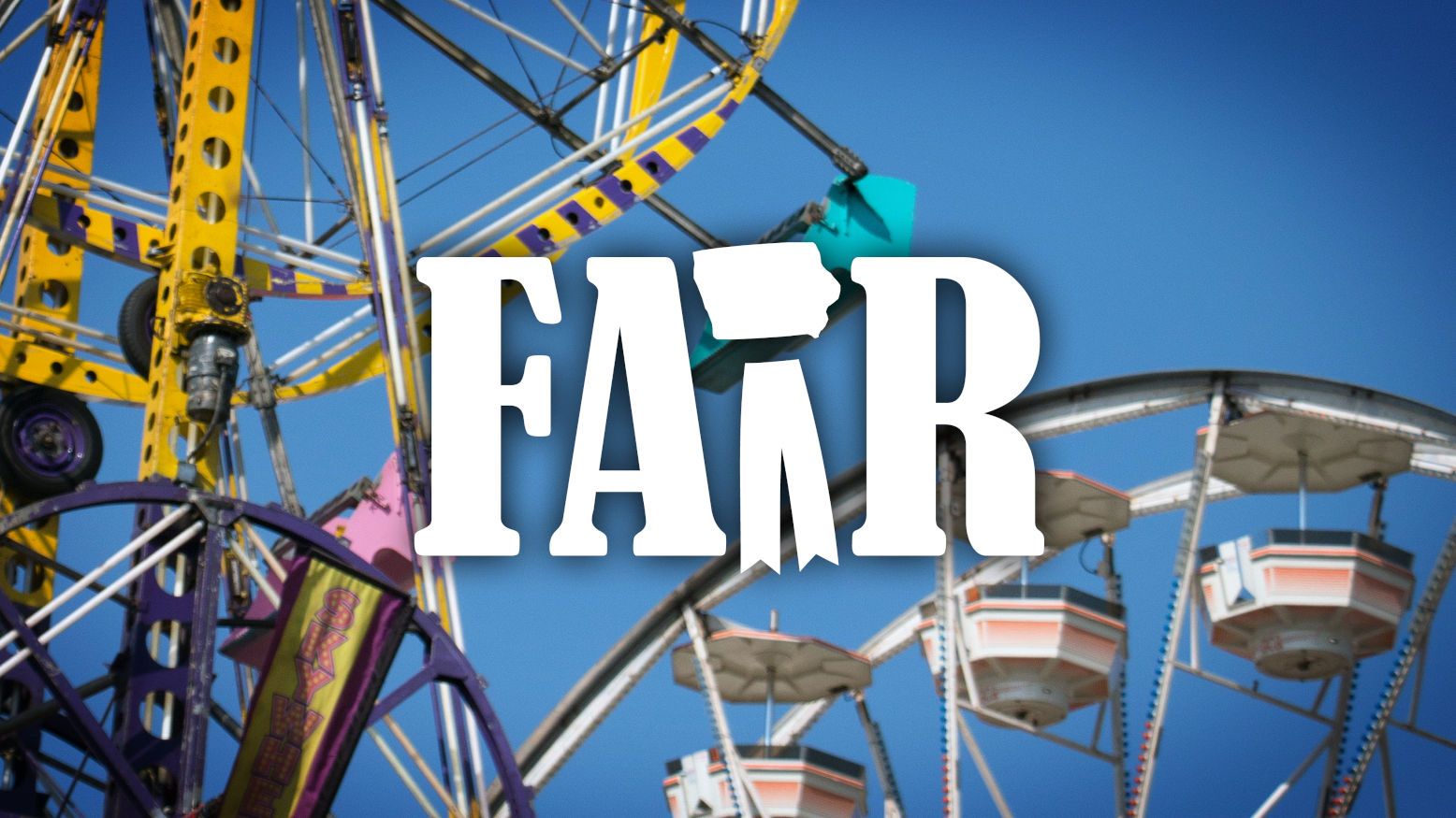 The word Fair with images of midway rides in the background