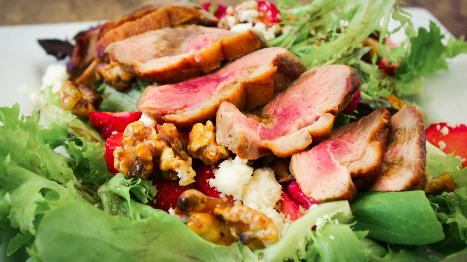 Duck Salad with Strawberries, Feta, and Candied Walnuts
