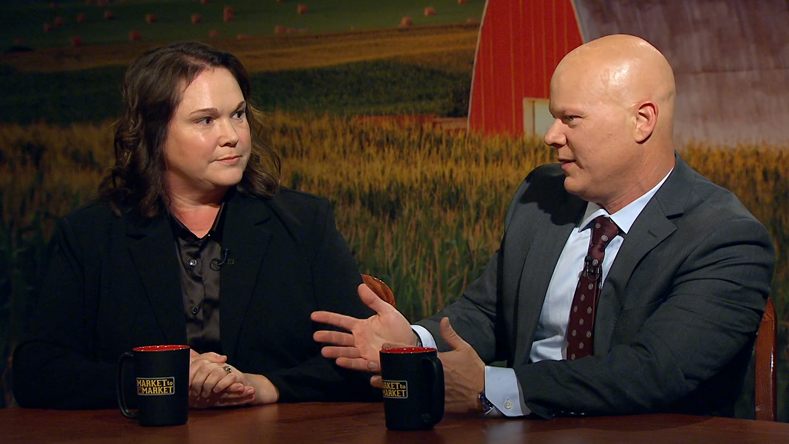 Naomi Blohm and Ted Seifried converse a the Market to Market desk.