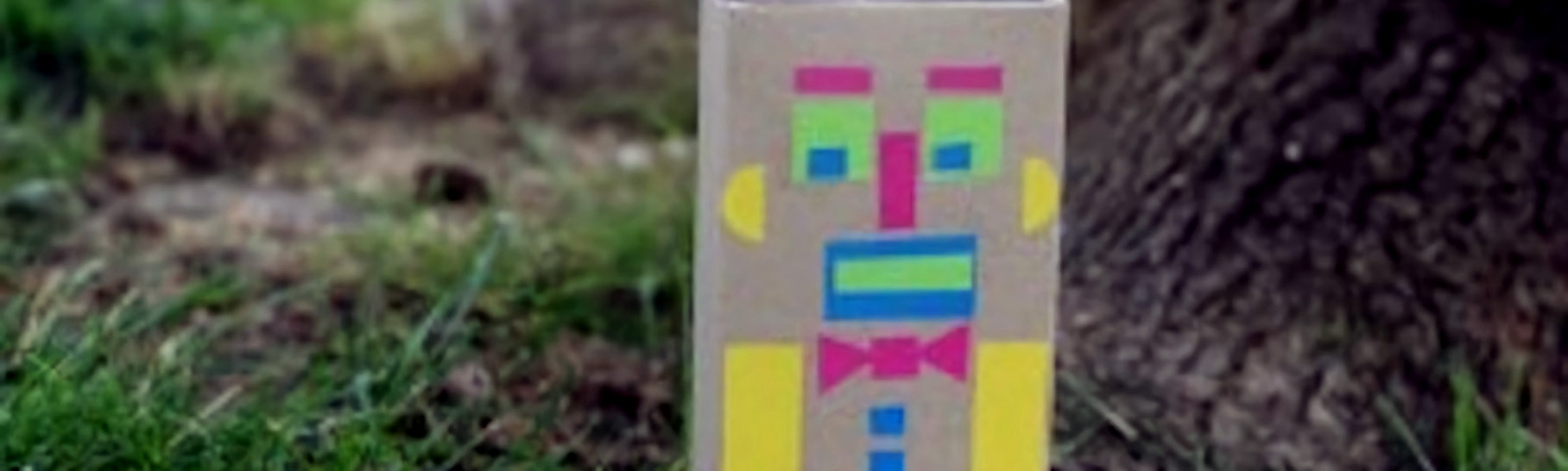 a robot made out of different colored shapes