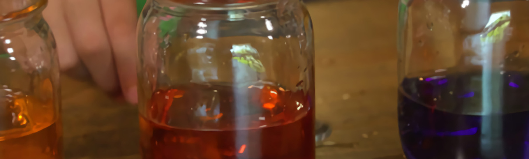 three jars with different water levels