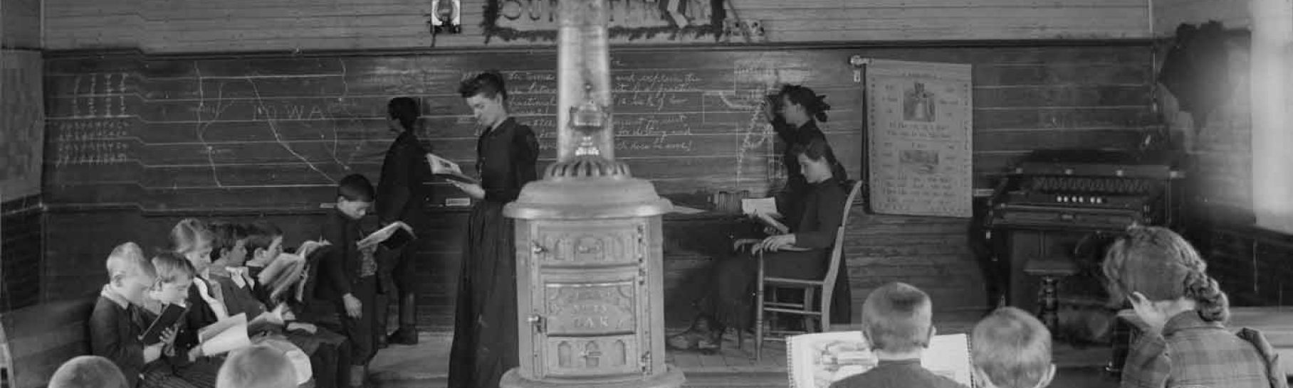 Interior view of the Bear Creek Township School showing class in session. Brooklyn, Iowa. ca. 1893.