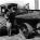 Farmer Beside Steam Tractor, ca. 1930 