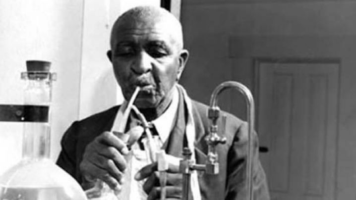 George Washington Carver working in his laboratory.