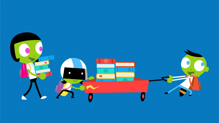 PBS KIDS characters pushing a wagon full of books.