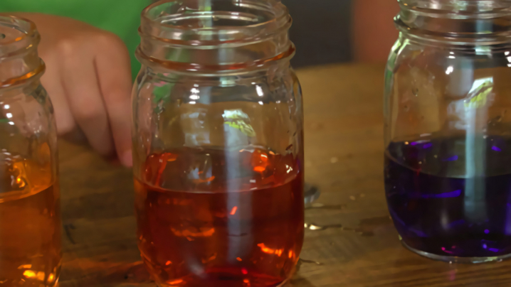 three jars with different water levels