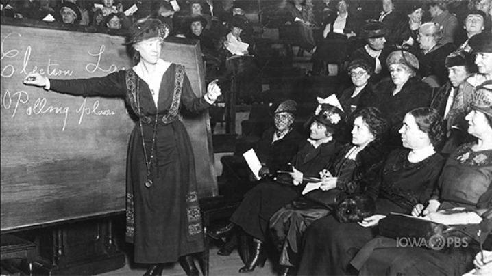 Carrie Chapman Catt is speaking to a group of women who are working towards suffrage for all.