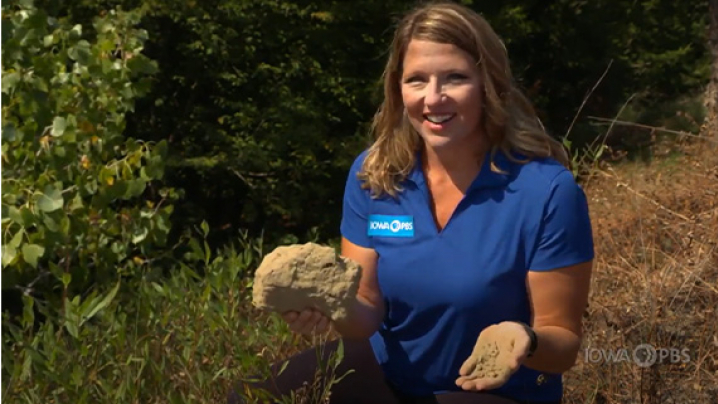 Abby Brown holding a clump of Loess soil.
