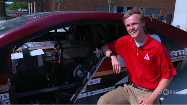 Michael Holm Assistant Director Iowa State University Prism Solar Car Club with the Prism Solar Car