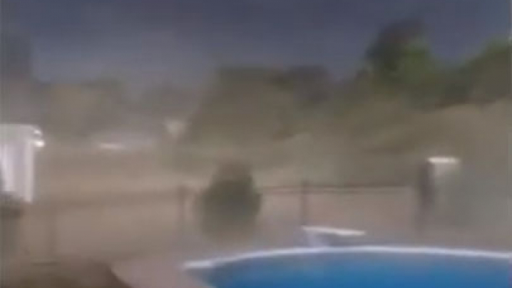 Topsoil being blown in the wind in a housing development.