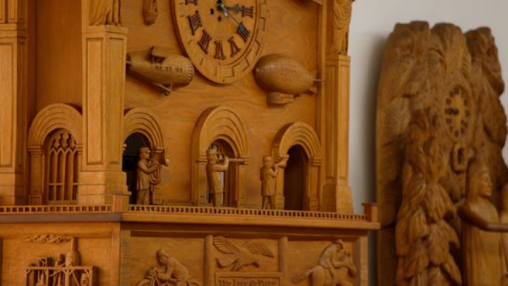 An ornate, wood-carved clock