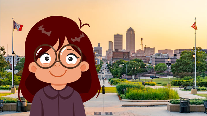 Young girl stands infront of the city of Des Moines.