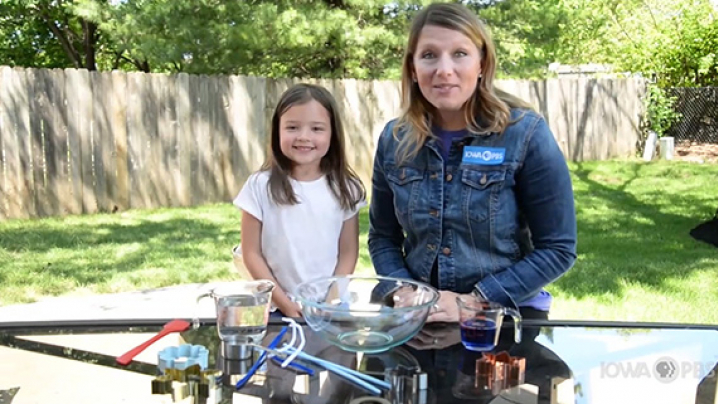 Abby and a friend have all the supplies to make homemade bubbles.