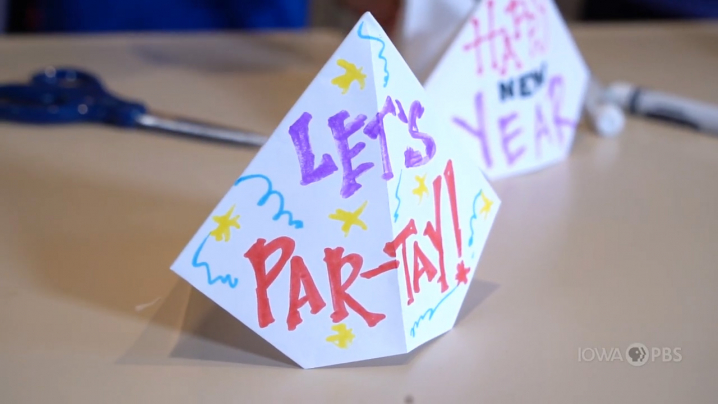 paper fortune tellers that say "Let's part!" and "Happy New Year"