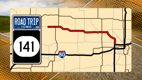 A yellow map with a red line along highway 141 in Iowa