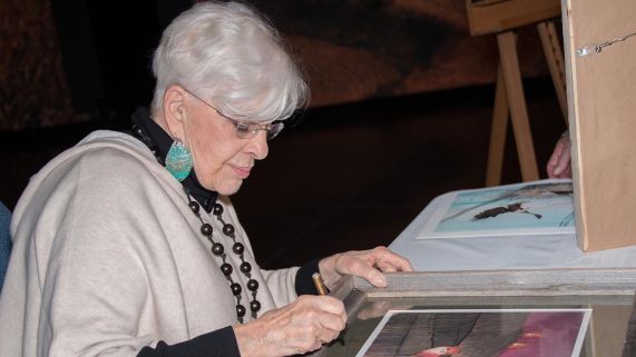 P. Buckley Moss paints in her home art studio.