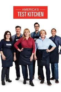 Six members of America's Test Kitchen stand wearing aprons in front of a white background.
