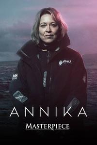 Nicola Walker (as DI Annika Strandhed) stands in front of open water while wearing a warm coat.