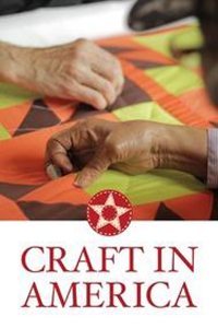 Craft in America - Two hands from two people working on a quilt together.