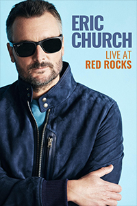 Eric Church Live at Red Rocks title above music artist, Eric Church's left shoulder. Church has his arms crossed while wearing sunglasses against a flat, light blue background.
