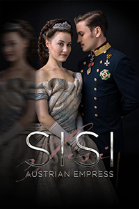 Dominique Devenport as Empress Elisabeth (Sisi) and Jannik Schümann as Emperor Franz Joseph stand close to each other. Sisi (in a formal dress and crown) looks at the camera with a blurred reflection of her to the left. And, Emperor Franz Joseph (in military uniform) faces Sisi with passionate eyes nearly shut.