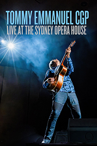 Tommy Emmanuel plays his guitar onstage.