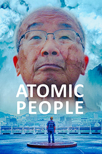 Atomic People title below the face of an elderly Japanese man in the sky with the mushroom cloud of an atomic bomb behind him. Below the title is a view from behind the man as he stands in a circle/marker looking out upon a city (possibly up at the face in the sky) and mountain/hillside.