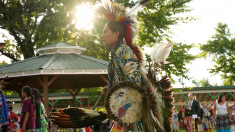 powwow participant in their regalia