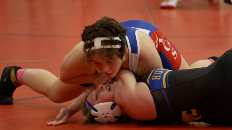 Two athletes in a wrestling match