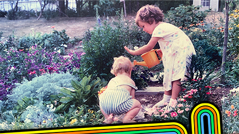 vintage photo of two young children gardening