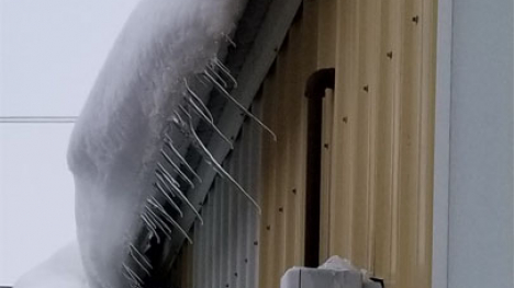 Icicles growing at an angle rather than straight down.