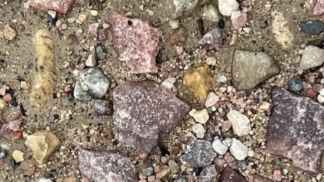 Variety of rocks including Punk Sioux Quartzite used on an Iowa Road
